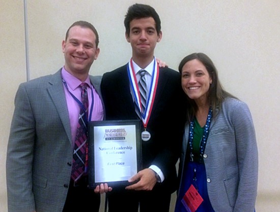 Student Leonardo Gutierrez receives his First Place at BPA.  Pictured with advisors Jason Freedman and Jacqueline Coll