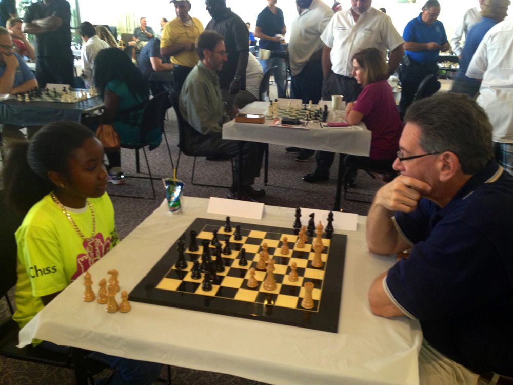 Laurderhill Mayor Richard Kaplan is challenged to a game of chess