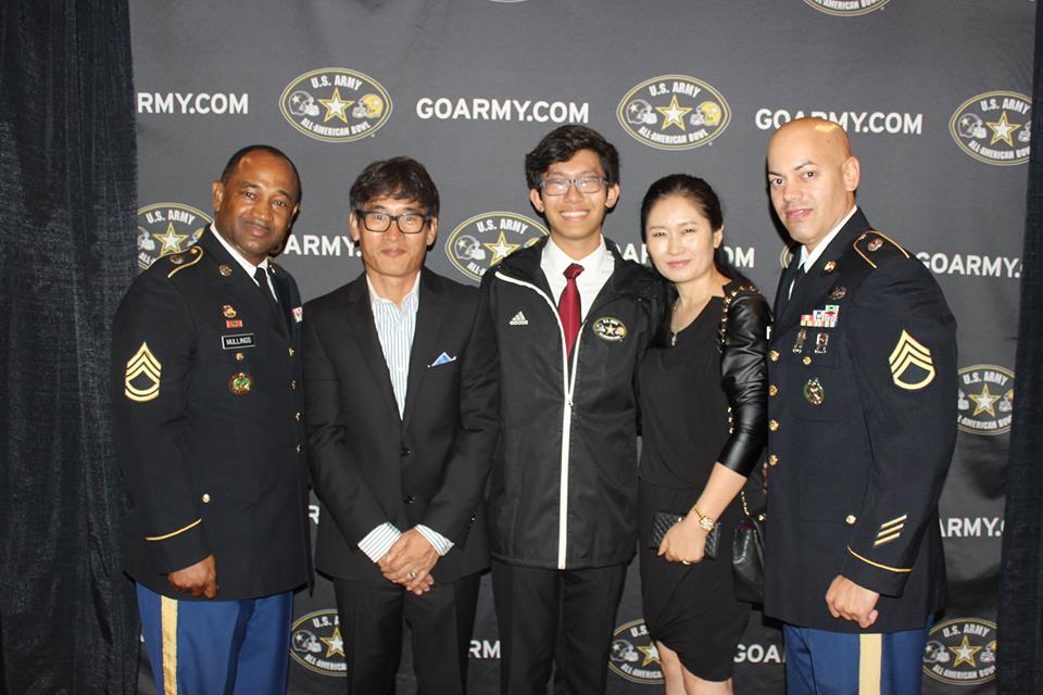 Williams Paek in the center with U.S Army representatives along with his father Jong and mother Jung. 