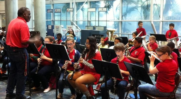 Music and Performing Arts Students Welcome Airport Holiday Travelers
