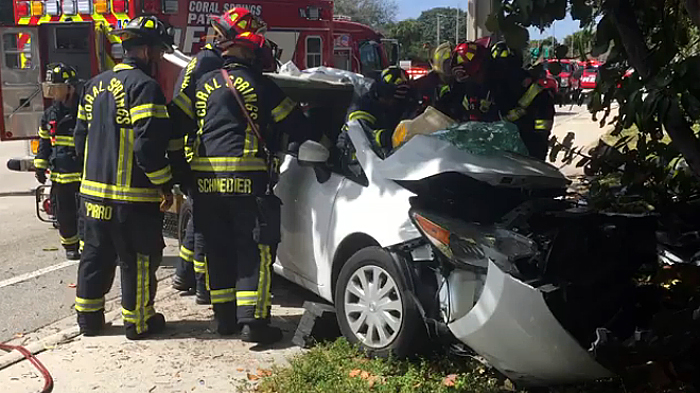 Driver Extricated From Car After Crashing Into Tree