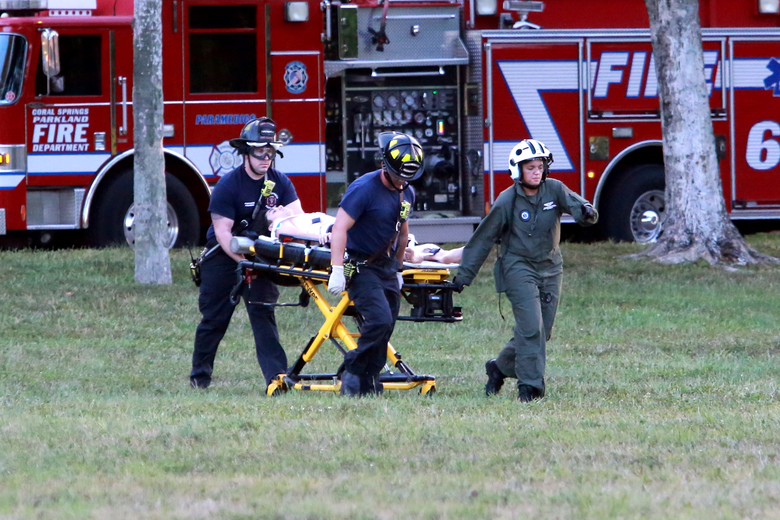 Paramedics transport victim of stabbing to air rescue. Photo by Jim Donnelly