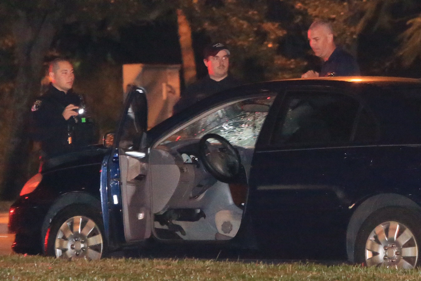 A Toyota Corolla struck a pedestrian on Sample Road on Wednesday night.  Photo by Jim Donnelly. 