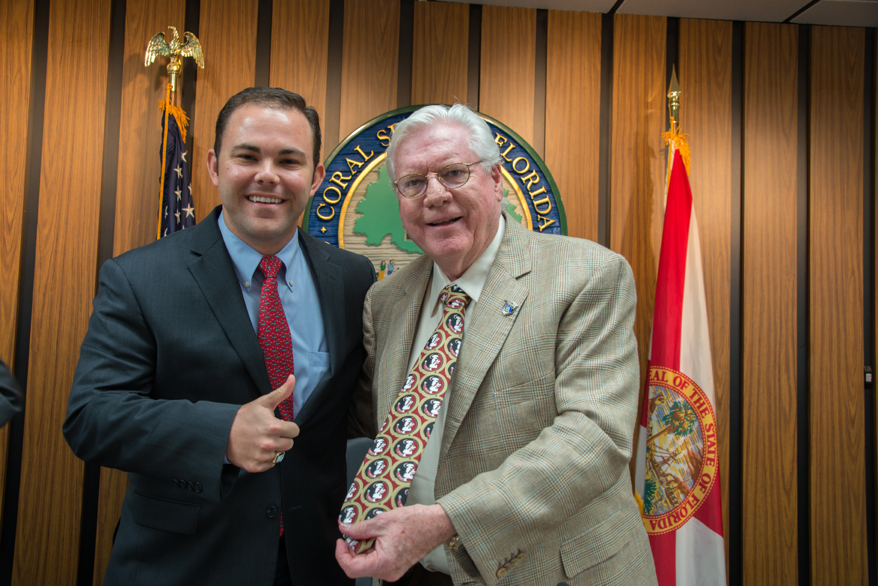 Vice Mayor Dan Daley with Mayor Skip Campbell. Daley, an FSU alum, gifted Campbell, UF alum,  with a tie from his Alma Mater after Campbell placed his bets on UF winning the game - and losing for the third year in a row.   
