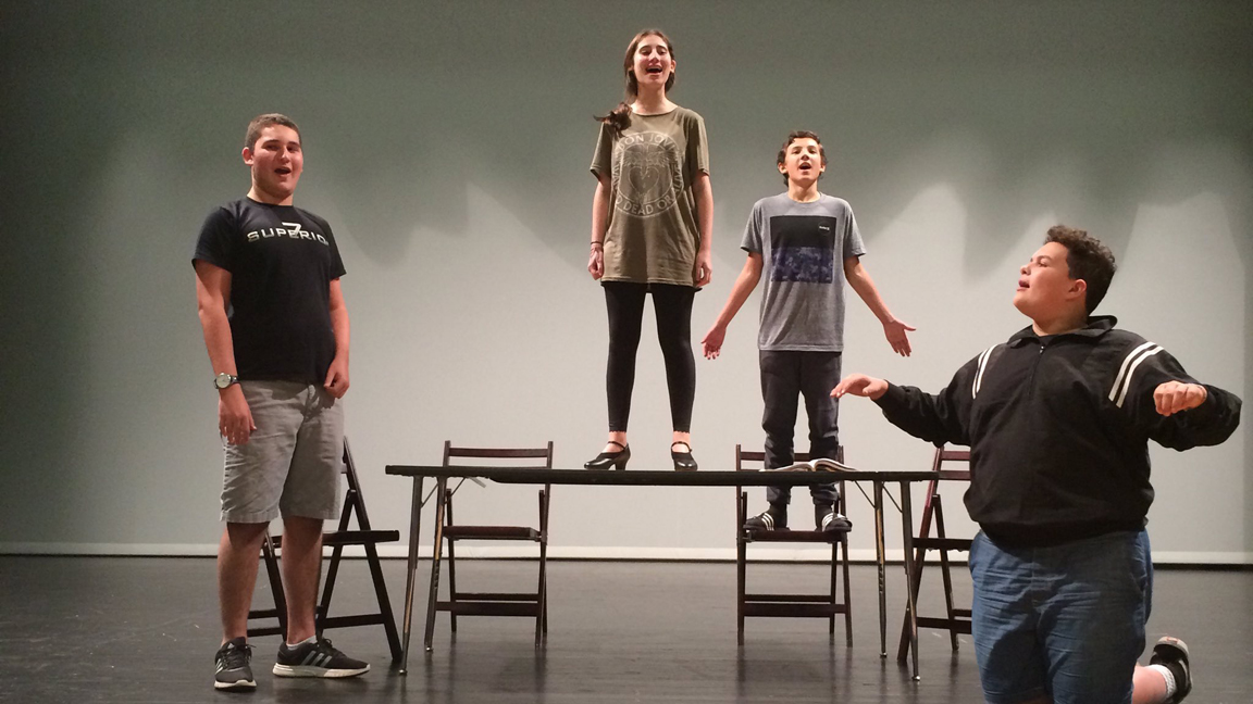 Cast members at Marjory Stoneman Douglas rehearsing for "Annie". 