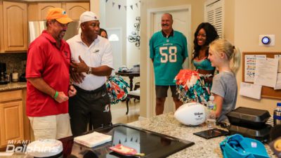 Miami Dolphins Alumni Nat Moore and Kim Bokamper surprised Patrick Moore at his home