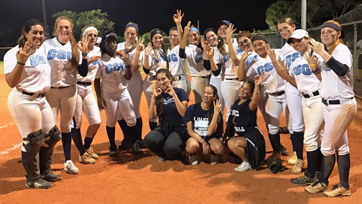 Coral Springs Charter Amanda Flynn (sixth from the left) with the 2017 CSC Softball  team celebrate their third-straight State Championship. Photo Courtesy CSC Athletics.