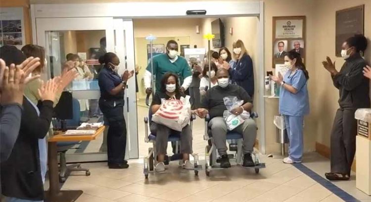 Broward Health Coral Springs Staff Cheer Couple Leaving After Surviving COVID-19
