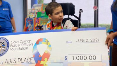 Coral Springs Police Foundation Donates $1K to Help Special-Needs Students 