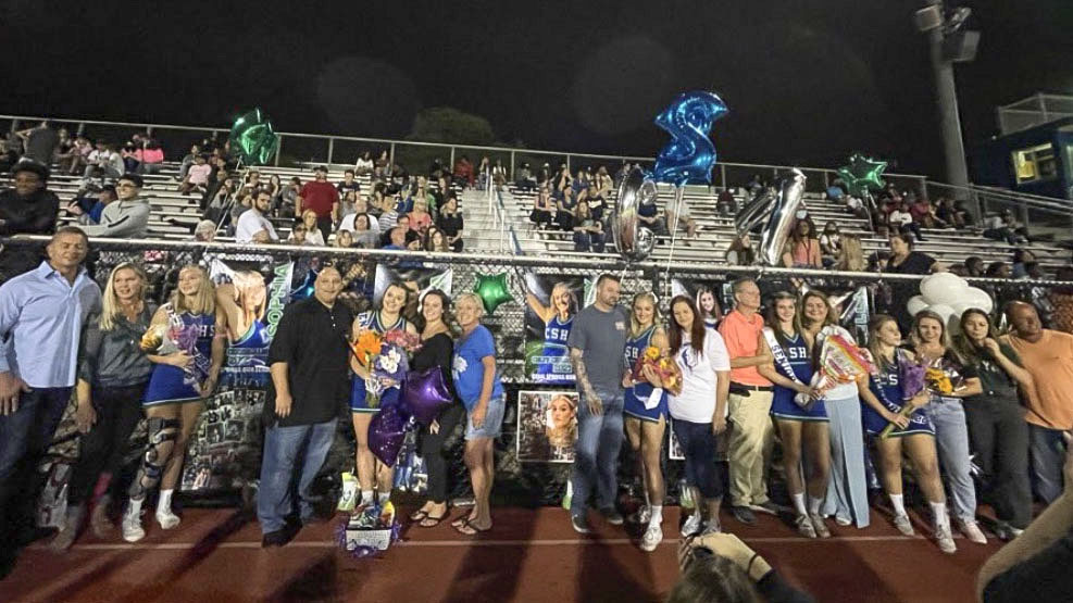 Coral Springs High School Cheerleading Team Honored on Senior Night of Football Game