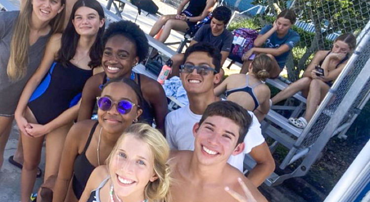 Coral Glades Sends 14 Swimmers to Regionals After District Meet