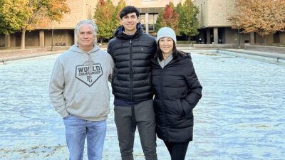Noah Greenseid with his parents Jon and Giulie. {Courtesy}