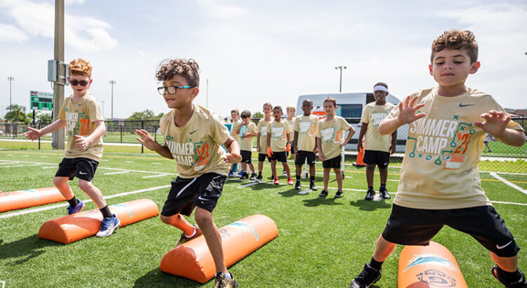 Register Now for Dolphins Football and Cheer Summer Camps
