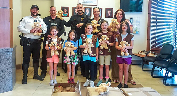 Girl Scouts Donate Over 100 Teddy Bears to Coral Springs Police