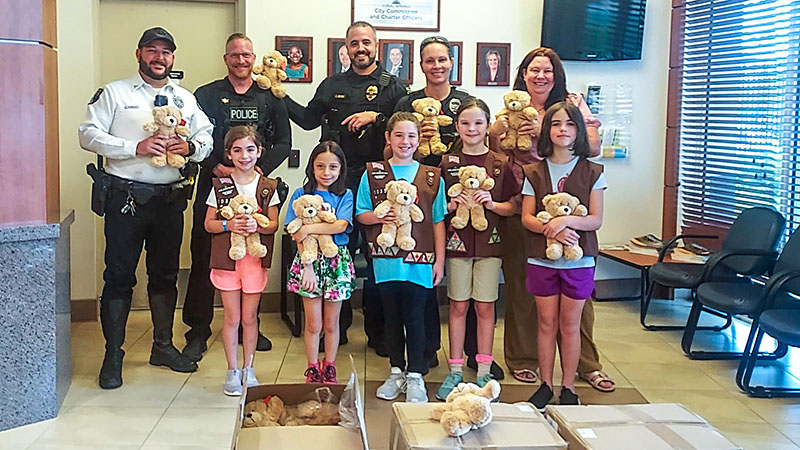 Girl Scouts Donate Over 100 Teddy Bears to Coral Springs Police 