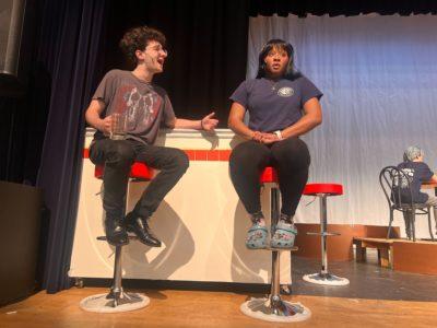 Austin Blakely and Ava Chen rehearsing for the play