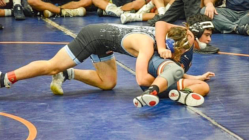 Coral Springs Wrestling Teams Dominate District Championships with Record-Breaking Performances and Regional Qualifiers