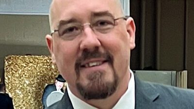 Meet Jon Price: The High School Debate Coach Who Helps Students Find Their Voice While Earning Awards Along the Way