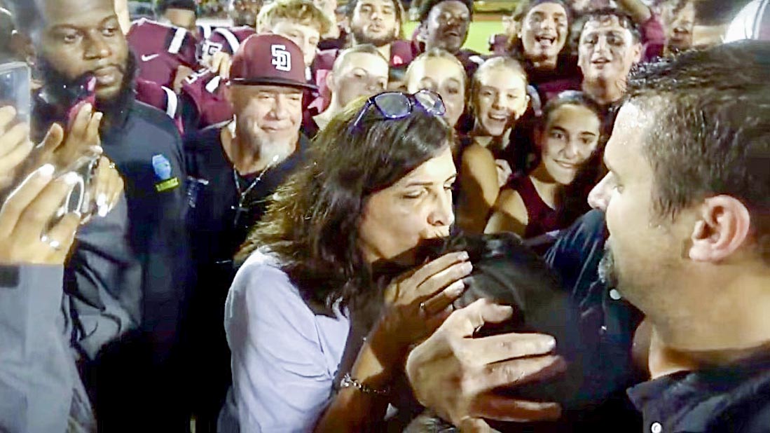 Principal Vivian Suarez Forced to 'Kiss the Pig' Following Friday Night's Football Game