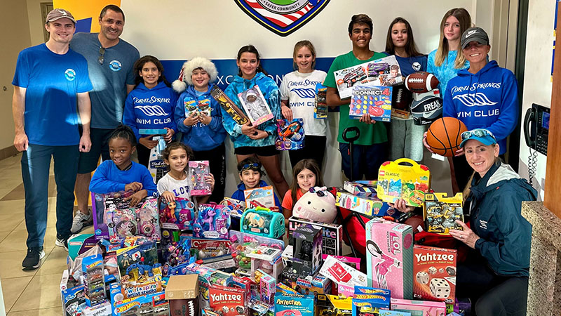 Coral Springs Swim Club Donates Over 120 Toys for Children in Need