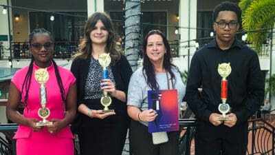 Malia Thompson, Skylar Jewell, David Thelot and their teacher Mrs. Fernandez