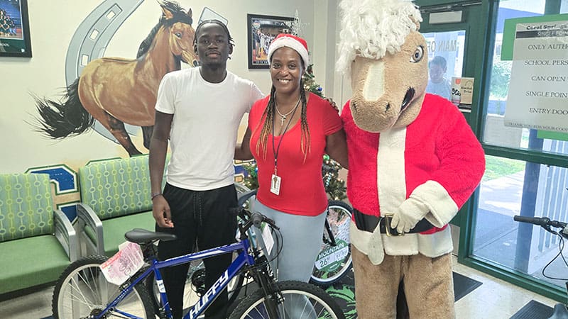Coral Springs High Senior Gets New Bike Through Holiday Drive Aimed at Helping Students Get to School on Time